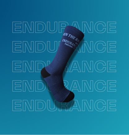 A single dark blue crew sock with black heel and toe sections and white text reading "RUN THE RACE ENDURANCE" on a blue gradient background.